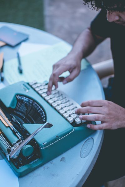 Young Man At Typewriter