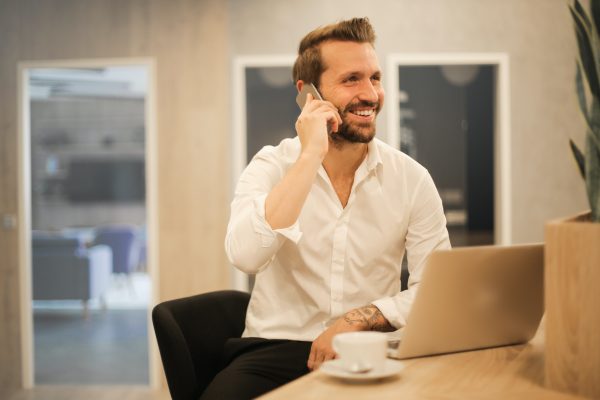 Smiling Man On Phone