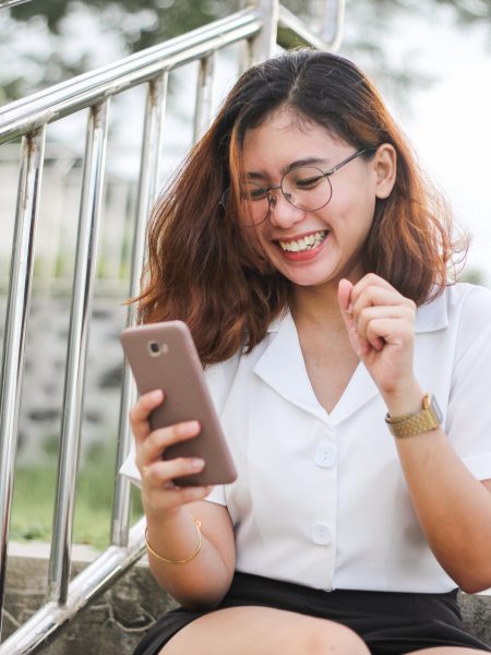 Woman Excited On Phone