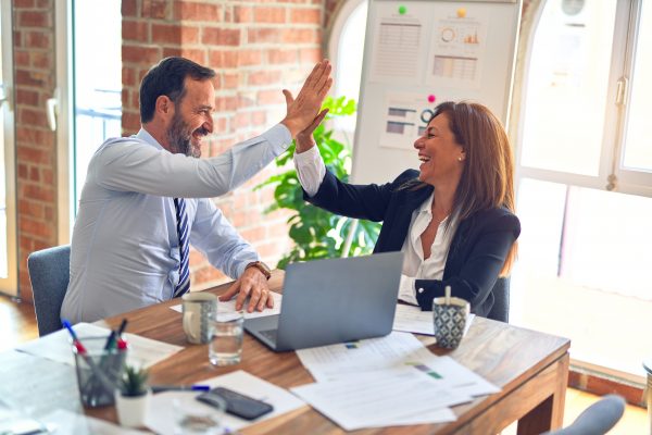 Coach Giving Employee High Five