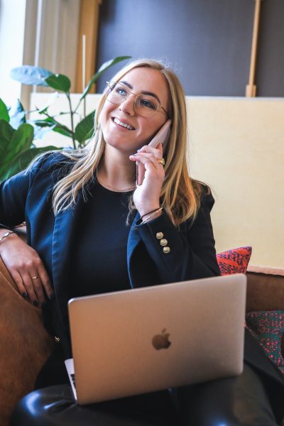 Woman Smiling On Phone