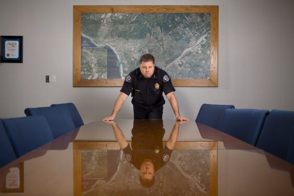Guard At Conference Table