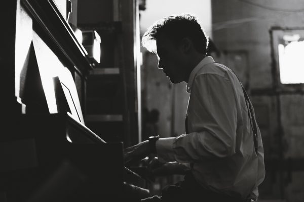 Man Playing Piano